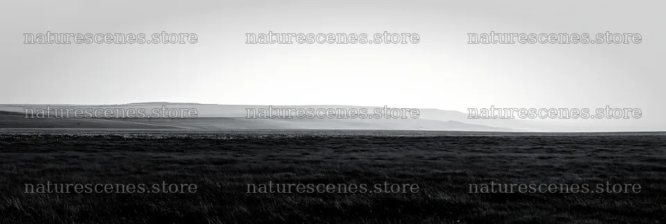 Cloudy limestone meadow with distant hills under overcast skies – nature scenes 13690x4602