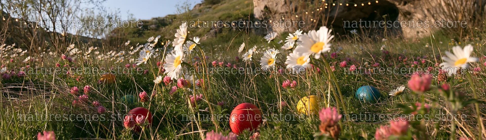 Christmas ornaments near cave in meadow – nature scenes 14762x4268