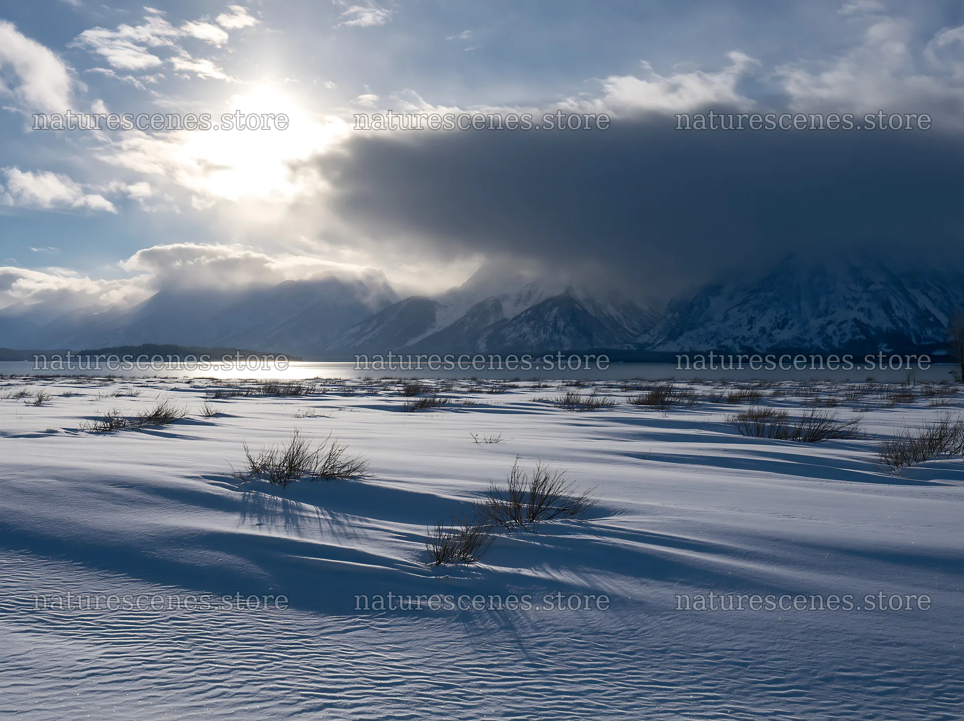 Snowy lakeside meadow with mountains and clouds – nature scenes 9174x6866